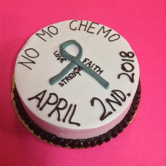 Simple Eggless Cake with a grey ribbon and caption "No More Chemo" to symbolise a young female patient's victory against Brain cancer in 2018