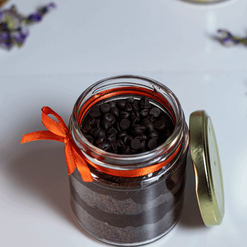 Layers of chocolate sponge and ganache in a dessert jar!