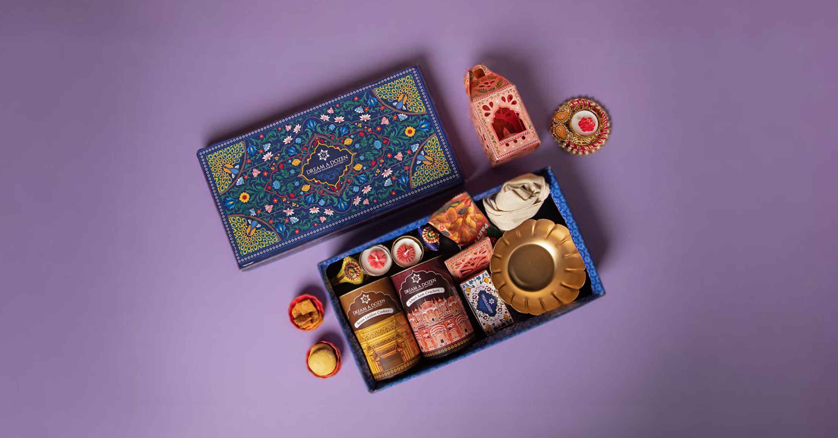 Assorted chocolates in a decorative box on a purple background