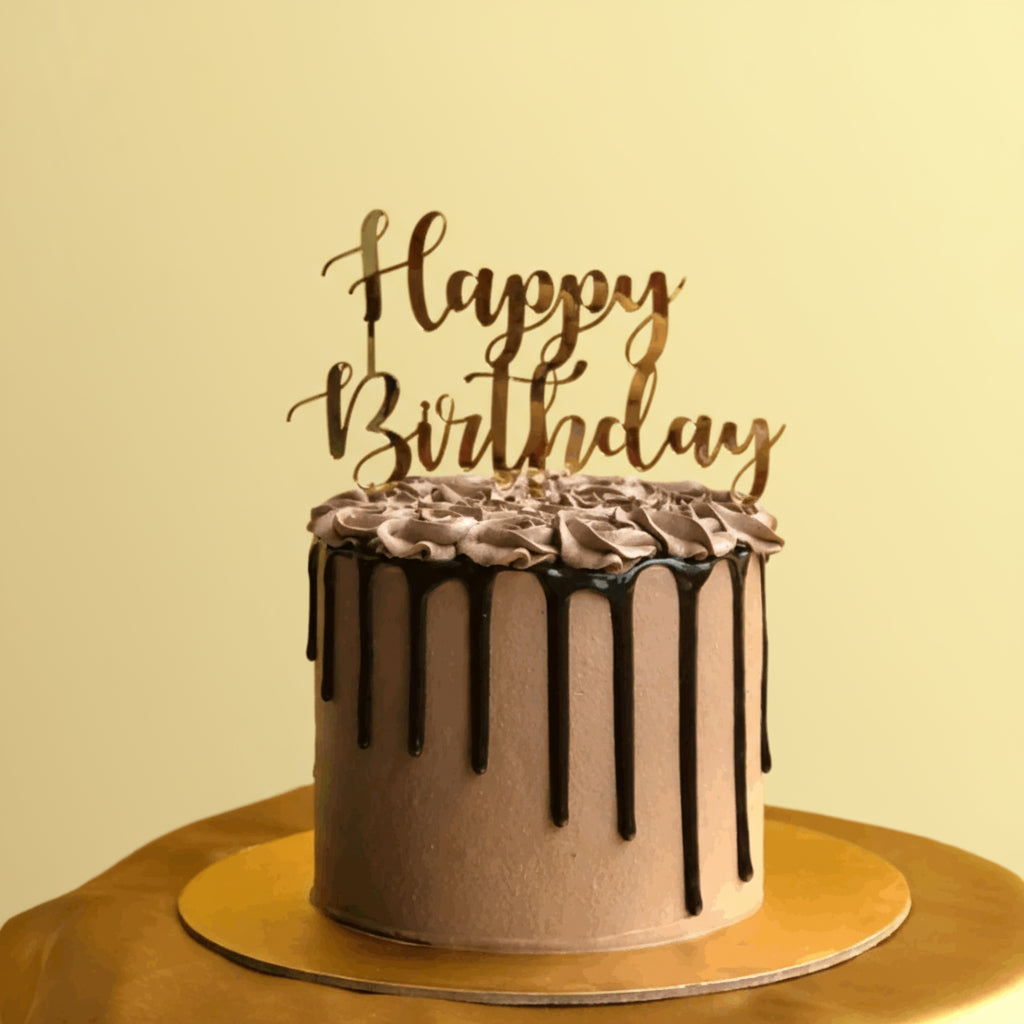 Chocolate photo roll cake with happy birthday tag