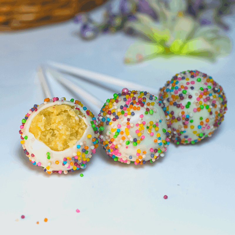 Vanilla cake pops with rainbow sprinkles on top. Delicious. Best cake pops. Bangalore.