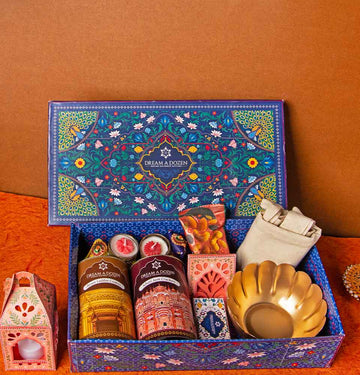 A Straight shot of one of our gourmet diwali gift hampers for employees with merchandise and eatables
