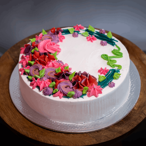 Buttercream floral frosting on eggless cake