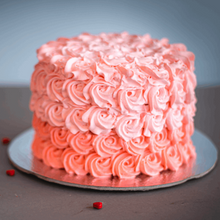 Load image into Gallery viewer, Dreamy rosettes frosted on a deliciously soft cake, decorated to suit your party colors!
