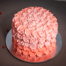 Load image into Gallery viewer, Dreamy rosettes frosted on a deliciously soft cake, decorated to suit your party colors!
