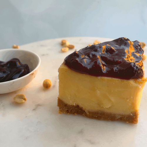 Eggless & gelatin-free New York-style cheesecake slice with blueberry compote!