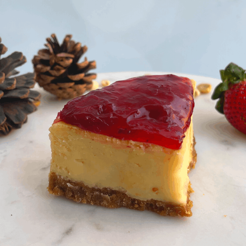 Eggless & gelatin-free New York-style cheesecake slice with strawberry compote!