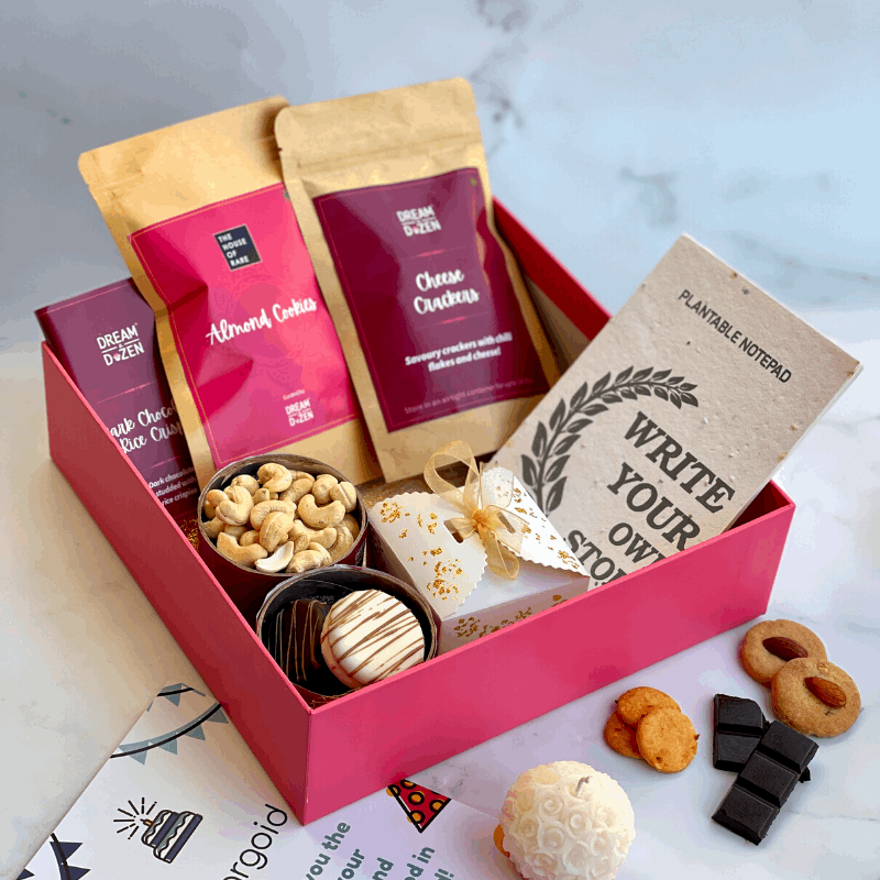 Gift hamper filled with merchandise, baked snacks and savories