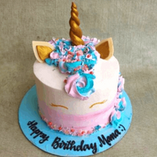 Load image into Gallery viewer, Non-fondant unicorn cake with unicorn horn made of chocolate
