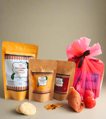 Packaged snacks with cookies and other items on a white surface