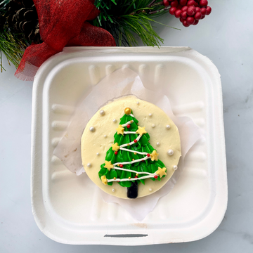 Christmas Themed bento cake that is both budget friendly and delicious to look at in the green, red and yellow colours of christmas and new year spirit. perfect secret santa gifts 