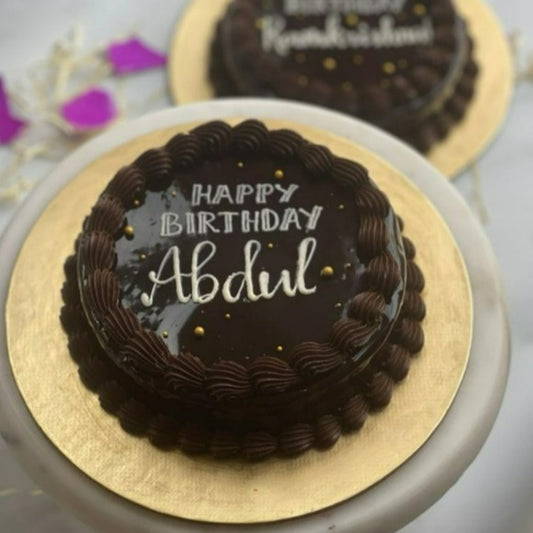 Birthday Cake. Best In Bangalore. Chocolate. Delicious. Yummy. Candid.Gooey, fudgy, and delicious eggless cake with rosettes to wow the party