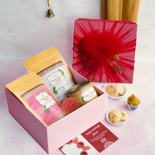 top down shot of our desi gourmet wedding gift hamper.  This premium hamper features a curated selection of our best creations. best wedding gift hamper.  perfect wedding return gift