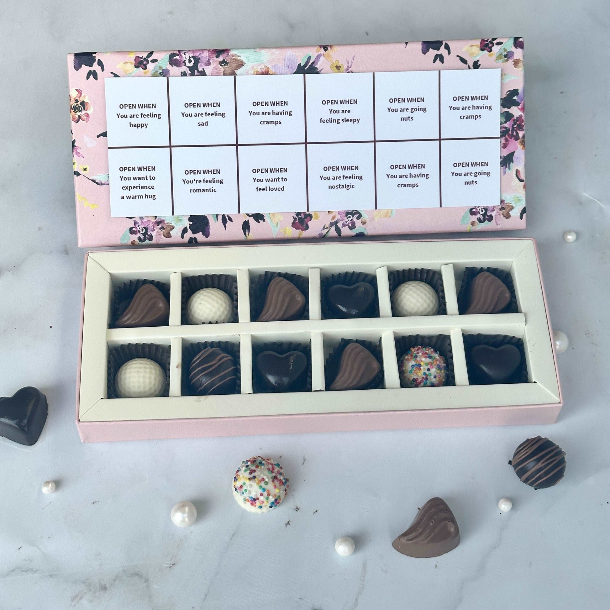 chocolates. open when chocolates. mood for chocolates. mood. women's day special. women's day. women's day chocolates. chocolates for mood. gifts for her. gift for women's day. gift hampers. dream a dozen. megna jain. chocolate boxes.