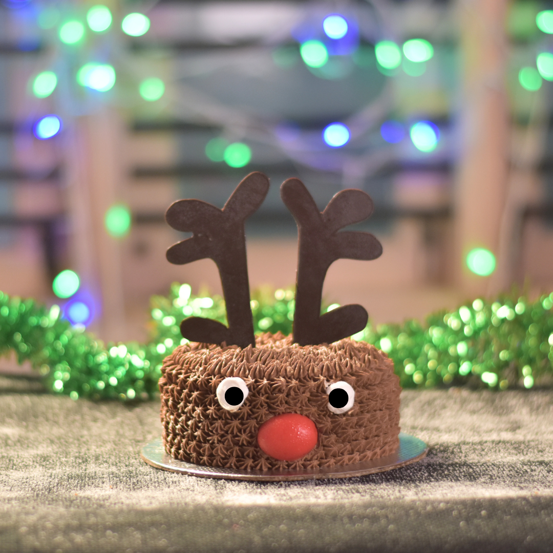 Chrismas cake. christmas party treats. reindeer cake. reindeer theme. christmas treats. christmas delights. secret santa. office christmas celebration.