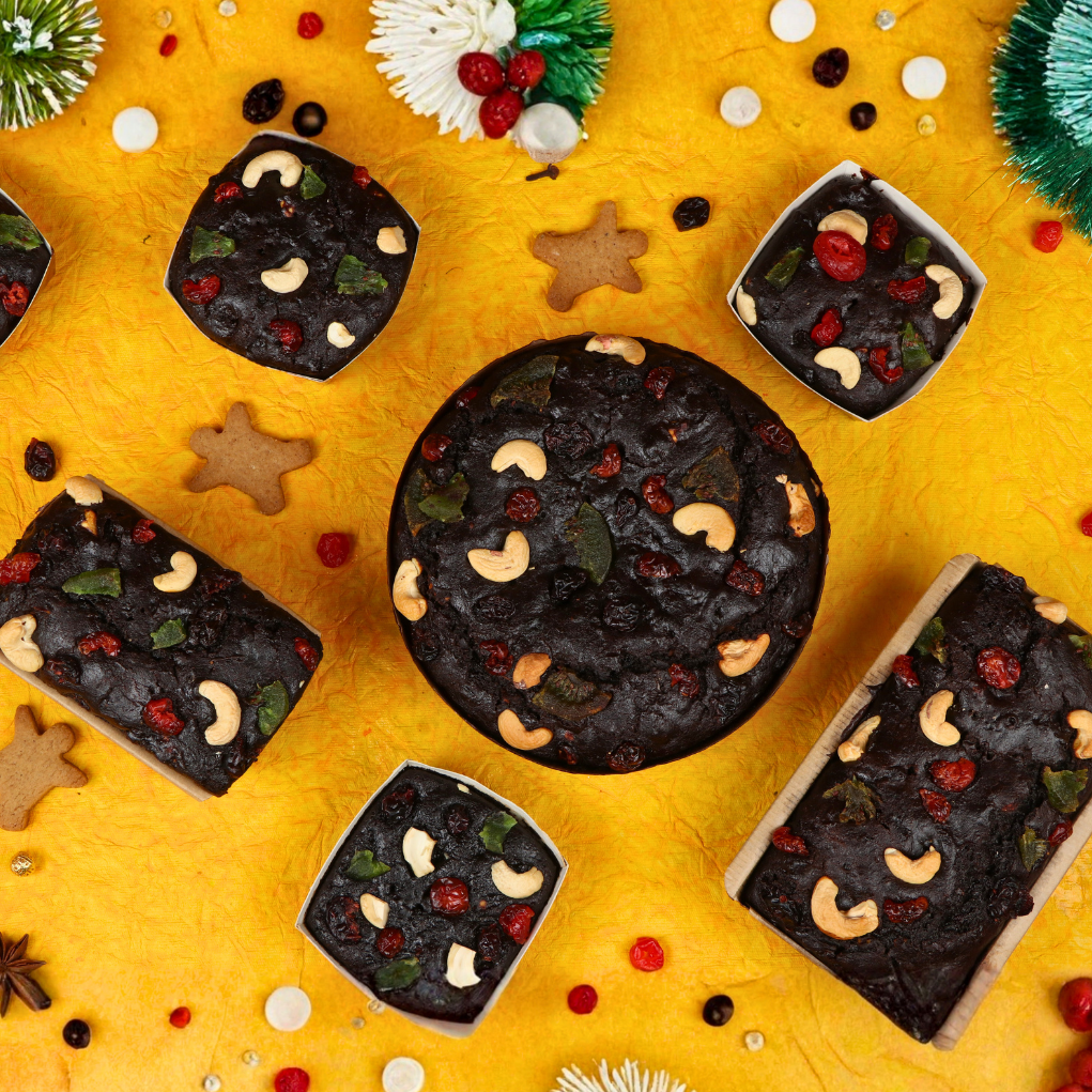 top shot of rich plum cake. perfect for your office christmas celebrations. secret santa gift idea for colleagues and loved ones.