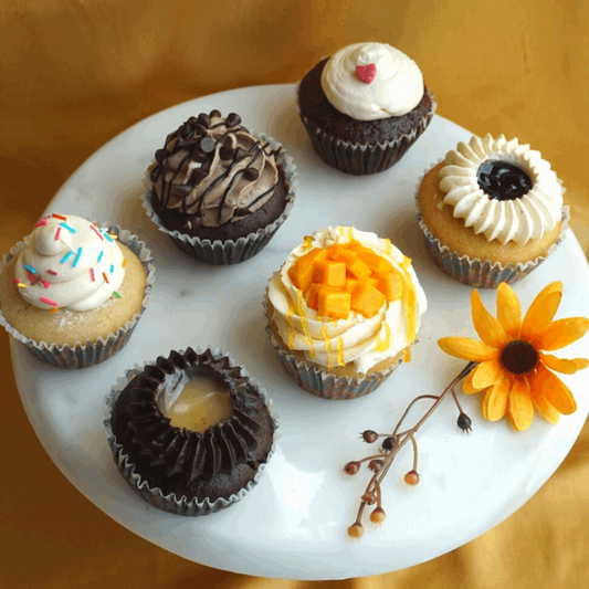 cupcakes. eggless cupcakes. best cupcakes. cupcakes bangalore. red velvet cupcakes. chocolate cupcakes. mango cupcakes. vanilla cupcakes. blueberry cupcakes. Choco caramel cupcakes. strawberry cupcake. yummy cupcakes. dream a dozen. bangalore bakery. best cakes in Bangalore