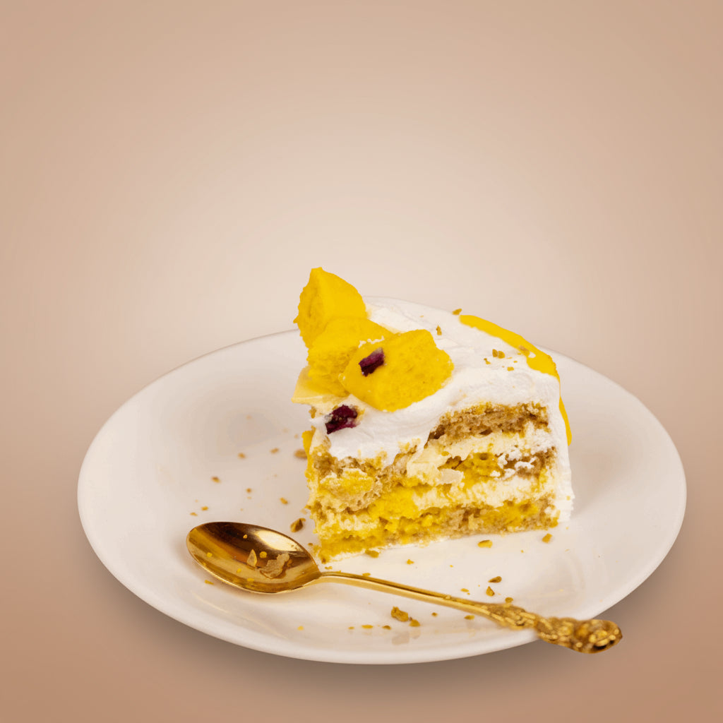 Rasmalai cake with a white base on a beige background