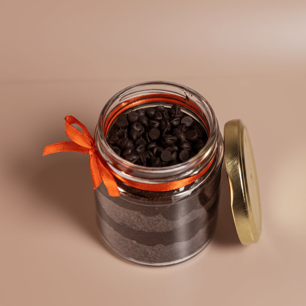 Layers of chocolate sponge and ganache in a dessert jar!